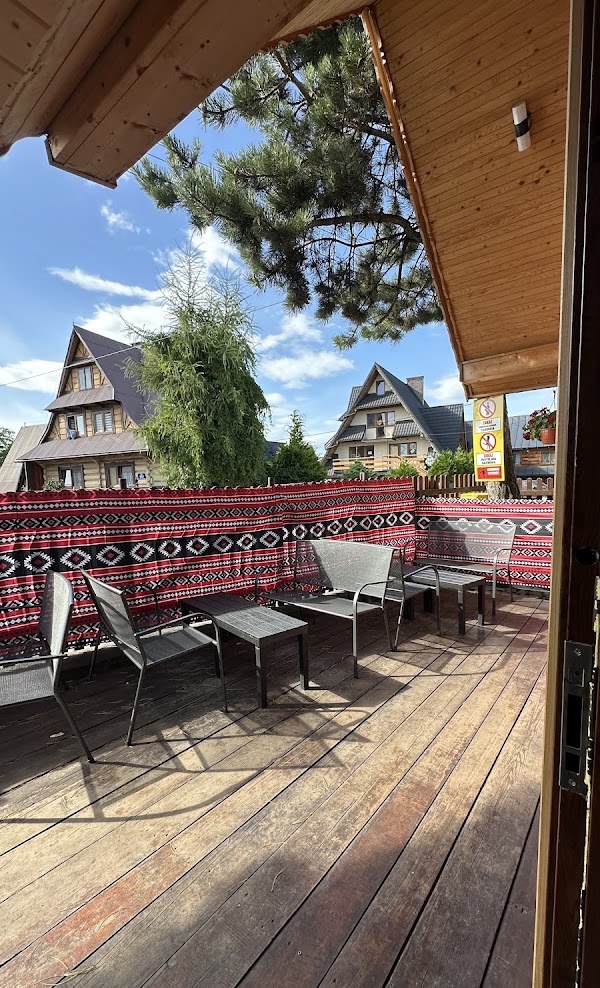 Covered terrace at Kebab Habibi looking out over highland houses